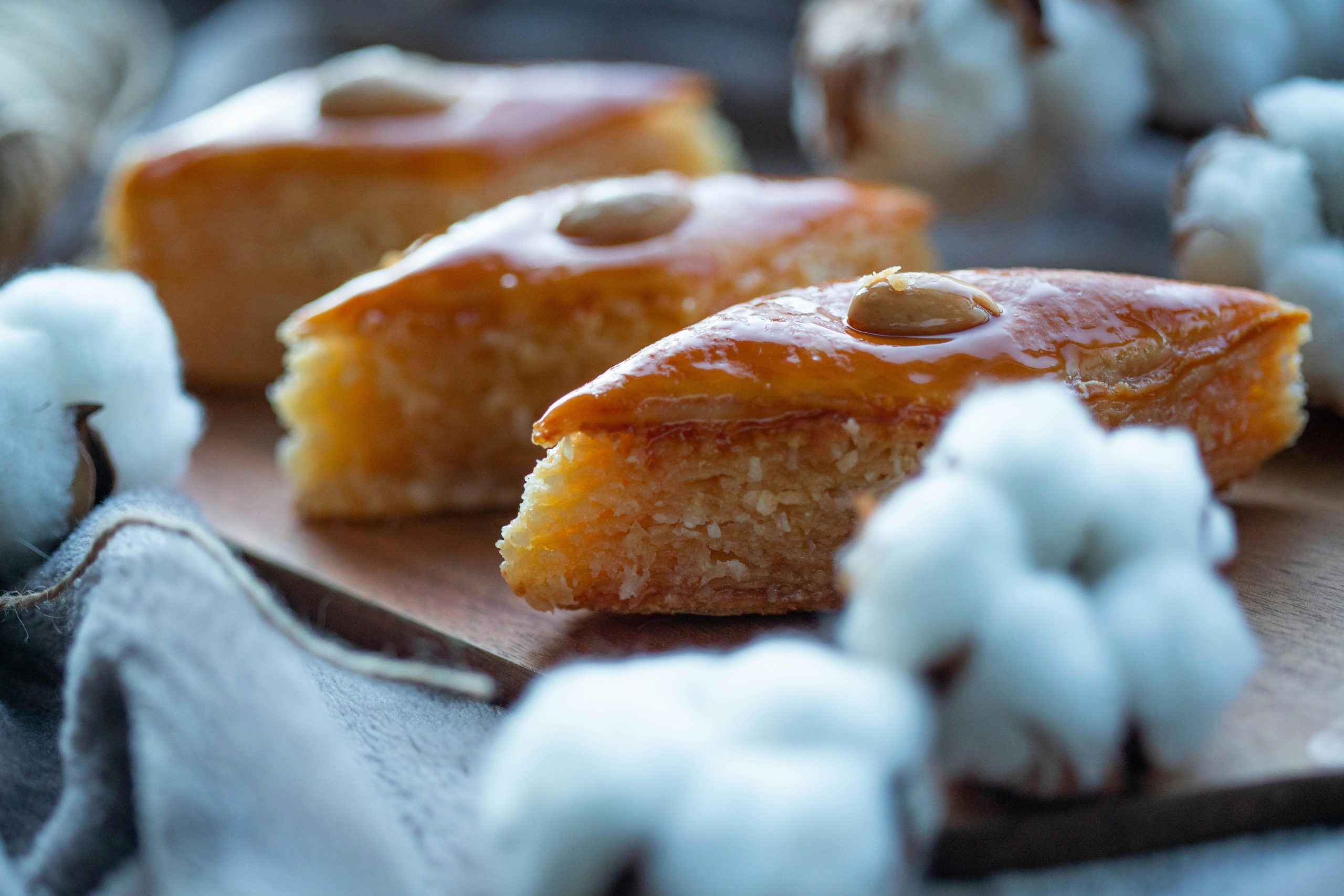 Delicious basbousa slices topped with almonds, perfect for dessert lovers.